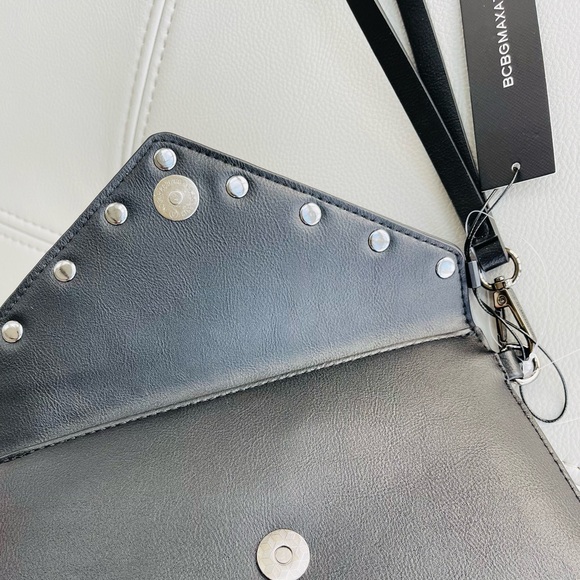 New With Tags
BCBG Pearl + Leather Inspired
Envelope Clutch in
BLACK - Picture 9 of 15